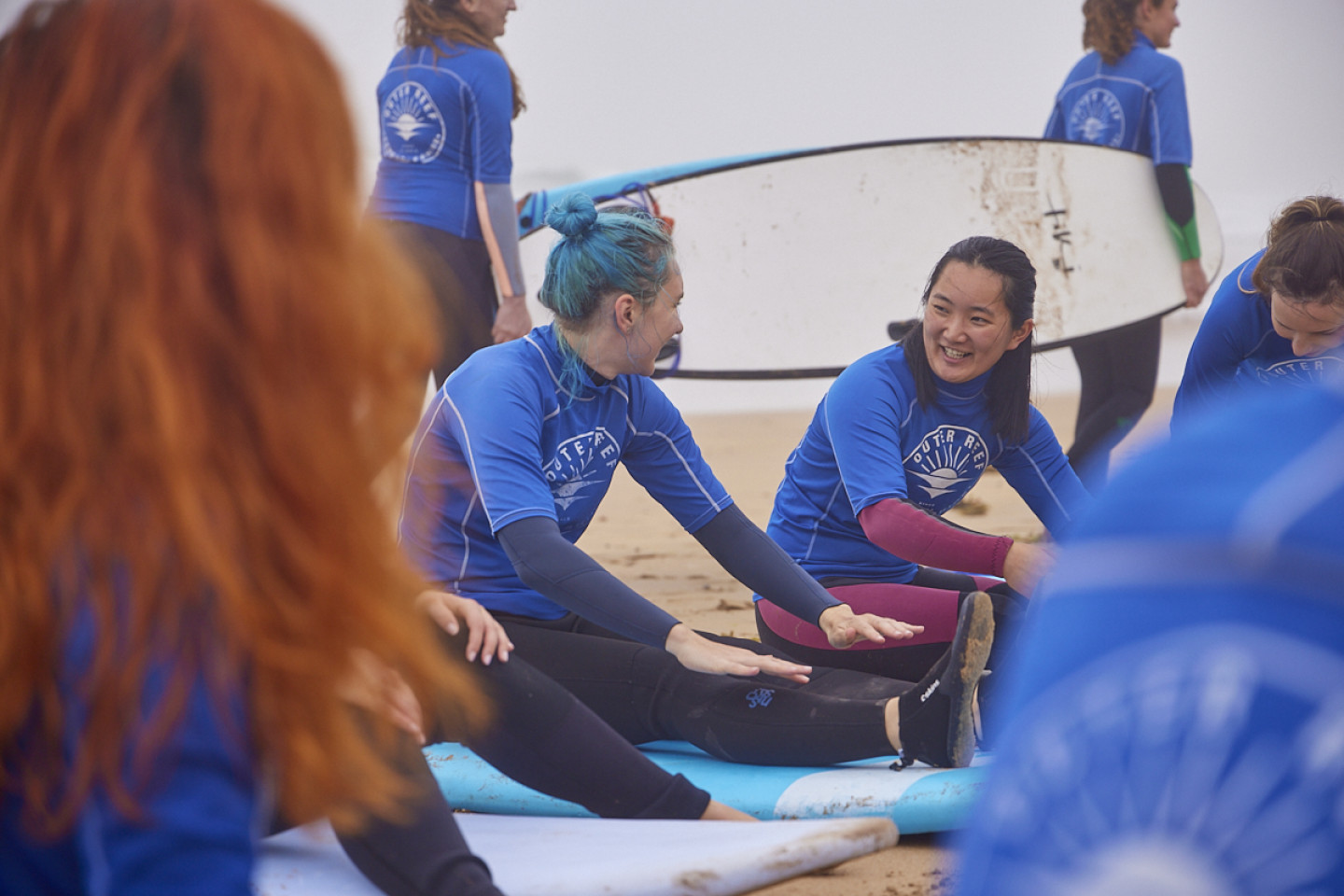 Women surfing with Salty Sisters in Pembrokeshire Wales