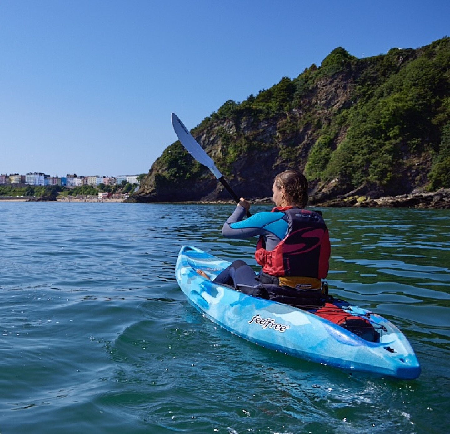 Women surfing together in Wales